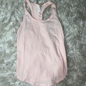 Lulu lemon light pink tank top. Never worn, size 4